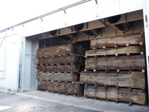 Kilning drys to tinber slowly and carefully.